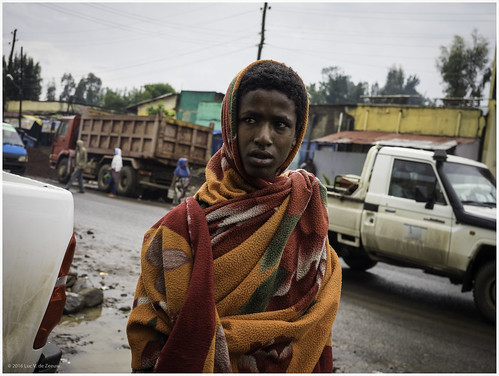 blanket boy car cold dirt ethiopia mud rainy street wet wereta amhara