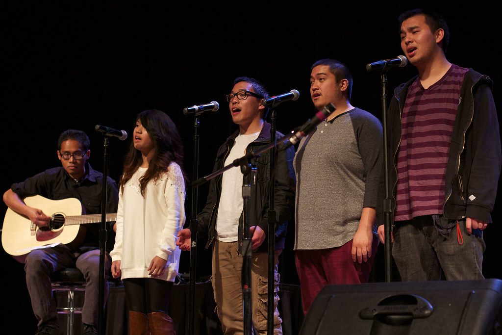 Members of PACE's choir group, Pil-Harmonix, perform a song at the Filipino Community Mural 10th anniversary celebration on Tuesday, April 2, 2013 at SF State's Jack Adams Hall. Photo by Jamie Balaoro / Special to Xpress