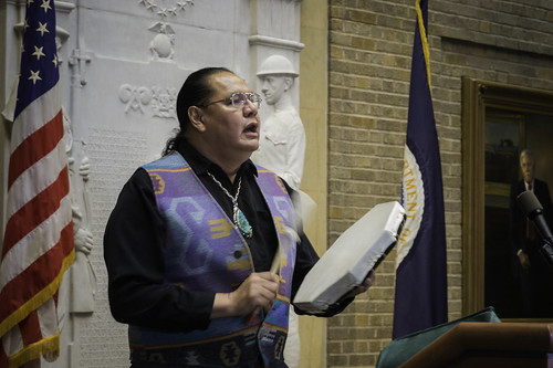 Dennis Zotigh, Kiowa, National Native American Museum shared Native cultures through music and song during the Native American Heritage Month Observance Cultural exchange at the U.S. Department of Agriculture (USDA) in Washington, D.C. on Thursday, Nov. 13, 2014. The Cultural Exchange featured Tribal College exhibit booths and cultural food sampling. USDA photo by Bob Nichols.