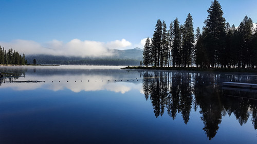 seeleylake montana lake outdoors mountains reflection clouds fog forest