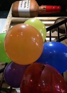 Rainbow balloon decorations at Bourbon Barrel