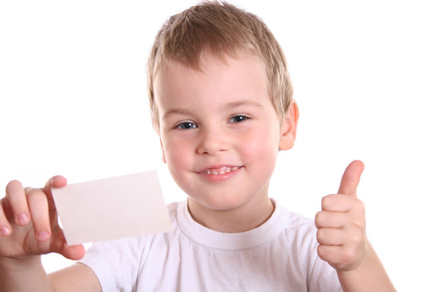 boy giving OK with card for text
