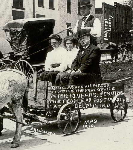 horses people woman usa man men history boys kids buildings advertising children clothing women mail postoffice delphi hats indiana streetscene transportation pedestrians buggy buggies businesses wagons livery carrollcounty realphoto hoosierrecollections