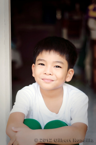 boy portrait people cute male boys childhood smiling kids children lens asian outdoors 50mm nikon day sitting child philippines young smiles manila innocence filipino nikkor frontdoor pinoy oneperson frontview whiteshirt headandshoulders brownhair 18d nikkorlens casualclothing 79years d90 lookingatcamera 50mm18d childrenonly oneboyonly 67years asianethnicity nikond90 valenzuelacity eastasianethnicity humanbodypart gilbertrondilla gilbertrondillaphotography luisianian gettyimagescollection gettyimagesphilippines frontdoorphotography