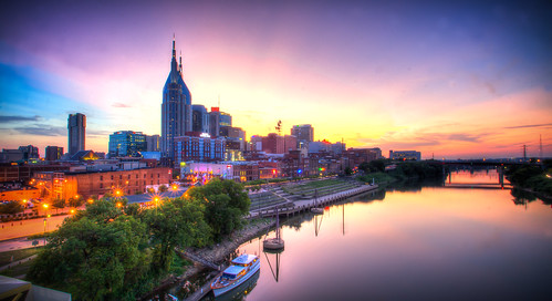 sunset reflection skyline photoshop buildings boat downtown cityscape nashville tennessee tamron hdr highdynamicrange musiccity photomatix sunsetview downtownnashville canoneos30d riverreflection 1024mm lightroom3 colorfuldowntown riverstands