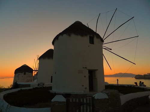 sunset windmills explore greece mykonos
