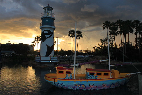 park lighthouse water canon boat orlando florida seaworld themepark suset