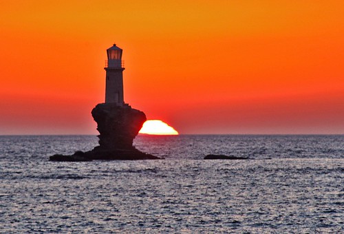 pink light red sea sky sun lighthouse yellow rock rocks zoom 300mm greece andros pentaxkx sulight aegeansea tourlitis