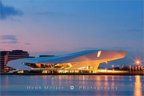 city longexposure travel blue light sunset sky holland reflection building eye art water netherlands amsterdam architecture canon reflections river movie lights star evening town canal twilight europe soft theater waterfront purple theatre modernart smooth capitol movies bluehour filmmuseum meijer theeye ij henk waterscape floydian proframe proframephotography canoneos1dsmarkiii henkmeijer elkedeluganmeissl romandelugan