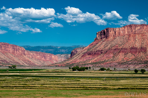 travel blue red sky cloud green horizontal clouds landscape photography photo colorado skies vibrant fineart conservation cliffs valley redrocks environment geology redrock cloudformation fineartphotography photogaph stockphotography fineartphoto geologicalfeature paradoxvalley soilconservation fineartphotograph conservationphotography joshwhalenphotography whalenphotography joshwhalencom