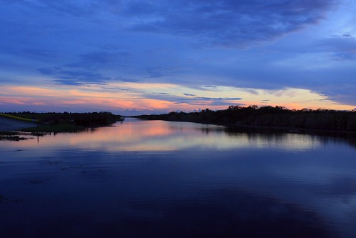 blue sunset reflection river unitedstates florida wildlife smooth bank bluesky calm national refuge southflorida loxahatchee calmwater smoothwater palmbeachcountyflorida