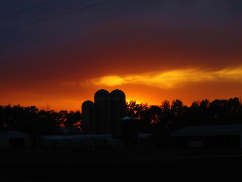 sunset dusty minnesota farm silo