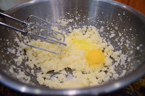An egg has been added to the mixture of ingredients.