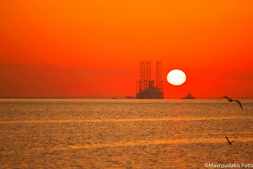 ocean trip sunset shadow red sea sky cloud sun bird tower water birds yellow backlight sunrise boat energy ship dynamic crane offshore seagull horizon platform gas greece helicopter pollution rig oil production petrol aquatic exploration oilrig sustainability drilling geological drillingrig positioned