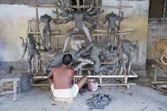 An Artist works on Clay Idols, Kumartuli (Kumortuli)