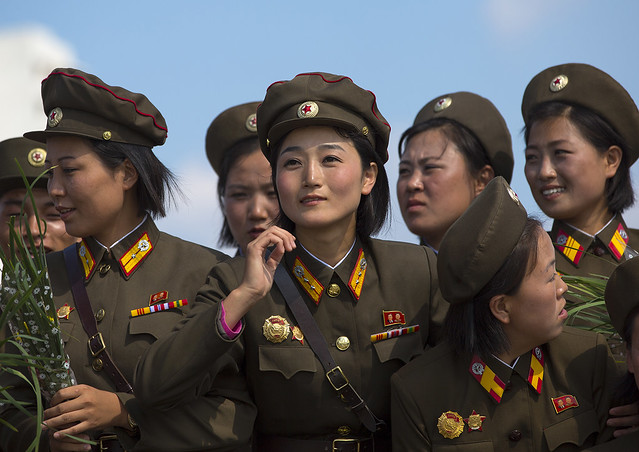 Smiling North Korean Female Soldiers In Tower Of The Juche Idea, Pyongyang, North Korea