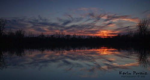 blue sunset red sun lake reflection tree water clouds evening kevin december michigan 2012 poand povenz