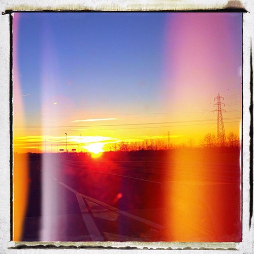 road street trip travel winter sunset sun milan streets reflection glass speed square landscape reflex highway day afternoon sundown milano squareformat end electricity straight iphoneography instagramapp uploaded:by=instagram foursquare:venue=4dcb9d9ac65bccd86749a70d