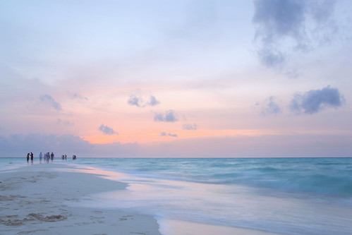 ocean pink blue sunset sea sky people beach water clouds evening sand colours purple turquoise indianocean shore maldives sandbank kuramathi