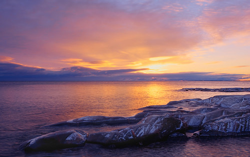 ocean sunset sea beach nature water beautiful clouds gold nikon rocks colours view sweden stones karlstad shore reef vänern hammarö värmland d700 nikkor28300mm