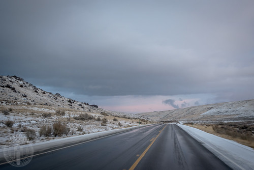 sunset snow highway driving idaho highway95