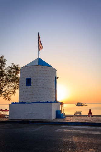 sea building beach architecture sunrise boat mediterranean flag greece rhodes rhodos stegna