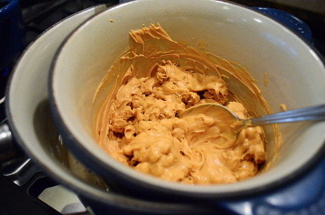 Butterscotch chips being melted in a pan.