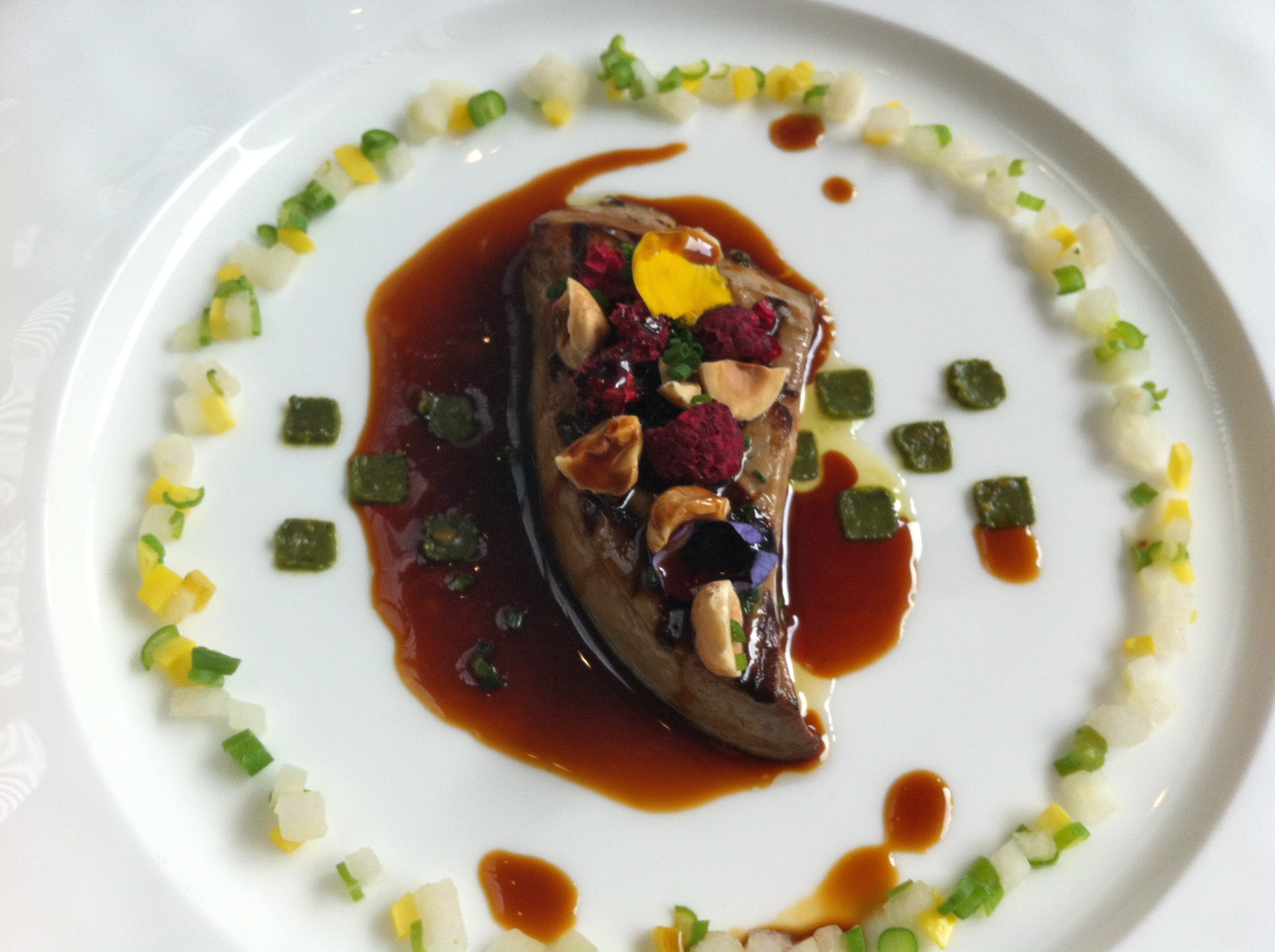 Foie gras pistachio “praliné,” seasonal vegetable brunoise, duck jus