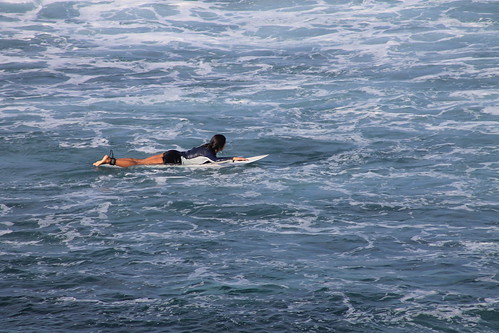 surfers in Maui