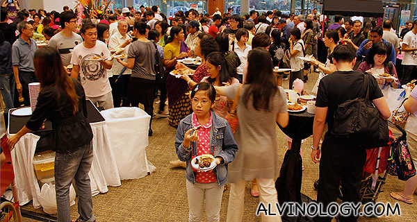 Public enjoying the free buffet spread and various games and activities 