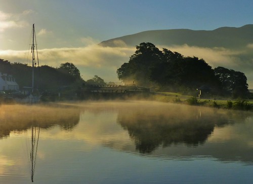 misty lock canal boat sunrise cloud mountains trees fort william corpach