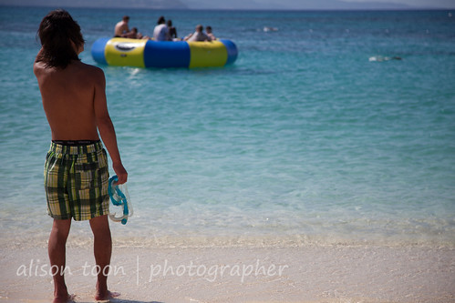 blue boy sea vacation sky copyright holiday tourism beach water seaside photographer turquoise restful peaceful tranquility trampoline jamaica caribbean raft tranquil youngman montegobay doctorscove alisontoon