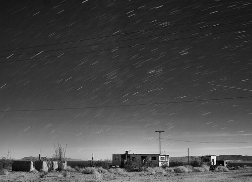 california longexposure blackandwhite bw abandoned night stars landscape route66 nightscape desert mojave ghosttown trailer startrails motherroad chambless silverefex