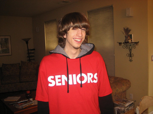 Boy #2 wearing a high school senior shirt.