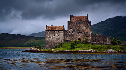 light storm castle clouds dark scotland skies historic loch eilean donan