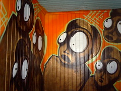 Graffiti in abandoned wooden villa