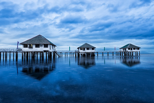 morning blue sea reflection water clouds sunrise reflections relax still day cloudy philippines peaceful resort huts hour bluehour batangas stilts calatagan resthouse 2013 arcreyes