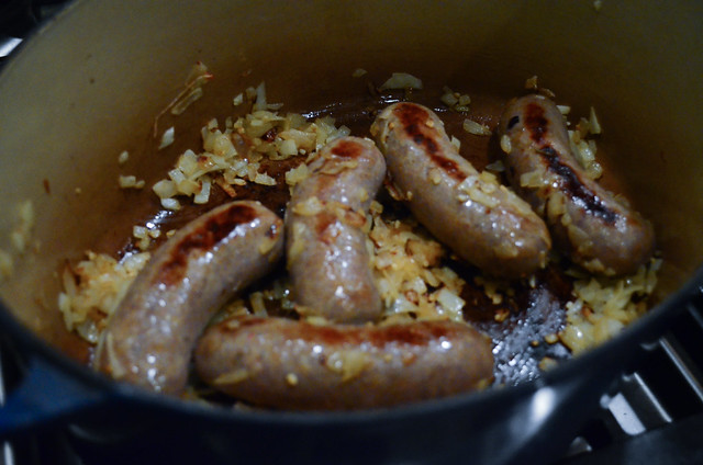The sausages have turned brown when they are finished cooking.