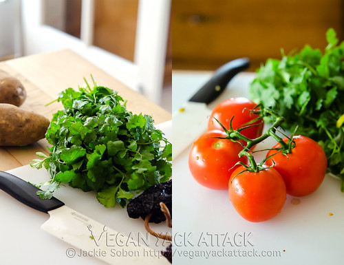 Fresh cilantro and tomatoes on a cutting board