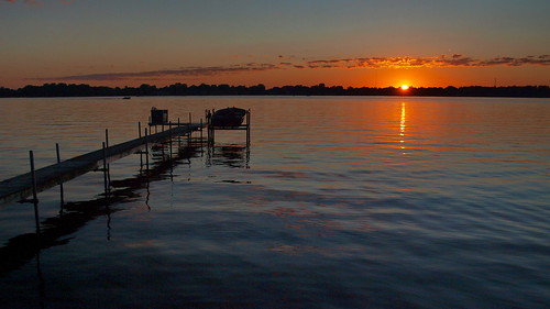 sunset mi reflections boat dock lakelansing midmichigan