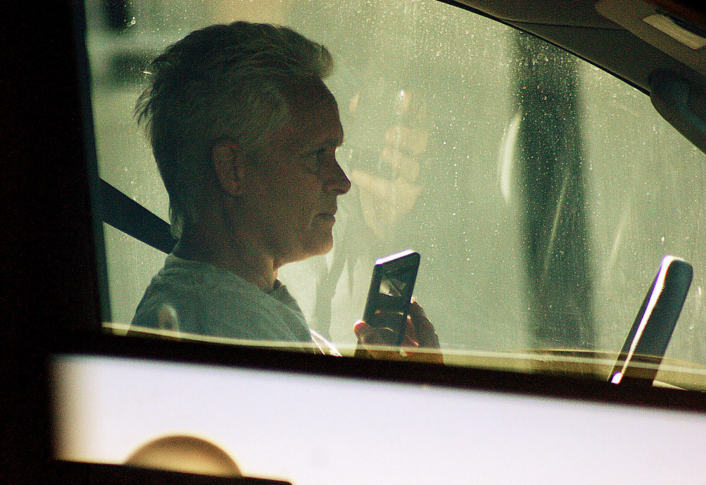 A driver talks on the phone while driving on Dolores Street in San Francisco on Monday, April 8 2013. Photo by Andy Sweet / Xpress