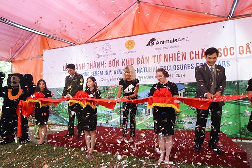 Animals Asia and Forest Protection Department's representatives cutting ribbon at the opening ceremony 1