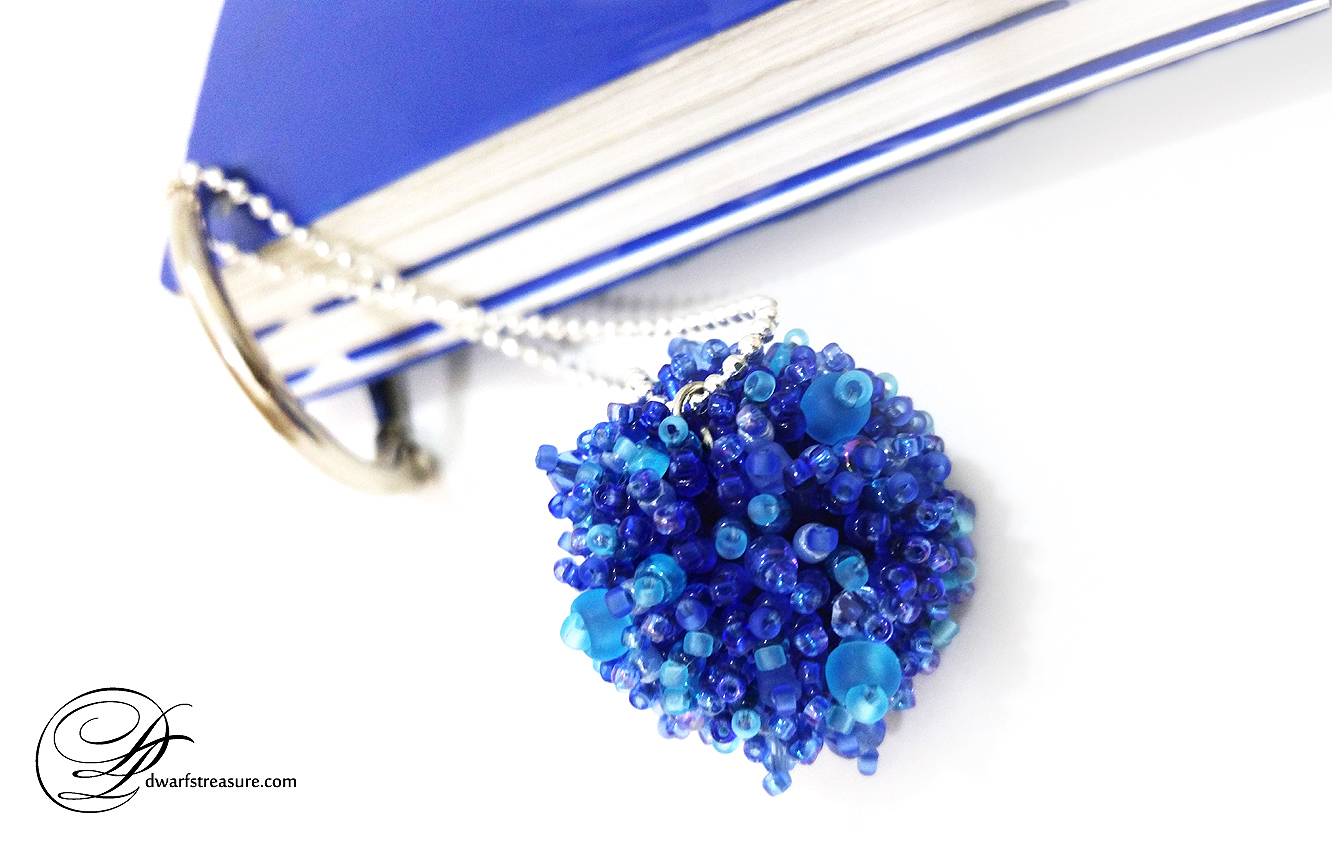 Pretty rich blue color beaded ball charm for notebook