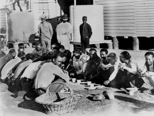 chinese queensland chinesesettlers colonial prisoners statelibraryofqueensland slq 1900s canebasket plaitedhair bread watertanks squatting guards uniform outdoors eating