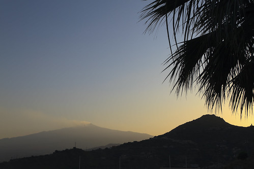 sunset silhouette smoke palmtree colcano