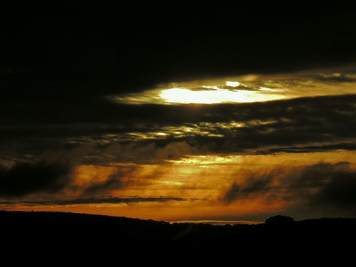 clouds sunrise dark gold dawn