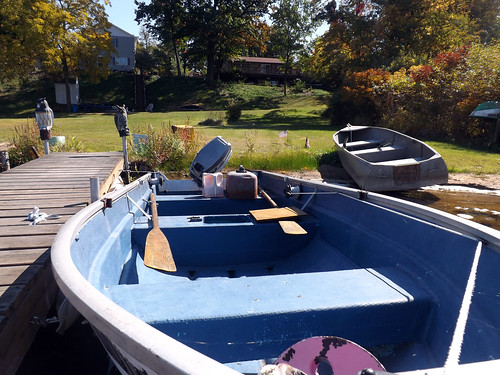 blue house fall yard boat dock