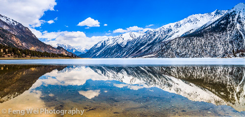 china travel vacation sky panorama cloud mountain lake snow color reflection tourism nature water beautiful beauty horizontal landscape scenery colorful asia tour view outdoor vibrant scenic vivid peaceful tranquility sunny nopeople panoramic tibet glacier serenity sacred stunning vista tibetan serene tranquil breathtaking ranwu ranwulake