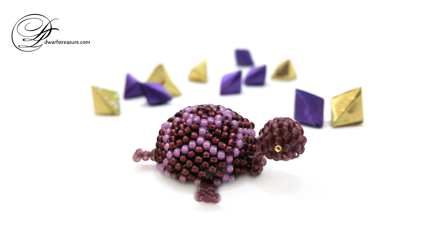 Purple original beaded turtle for home decoration