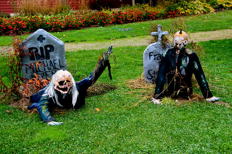 Thriller Zombie Pumpkin people coming out of the cemetery ground
